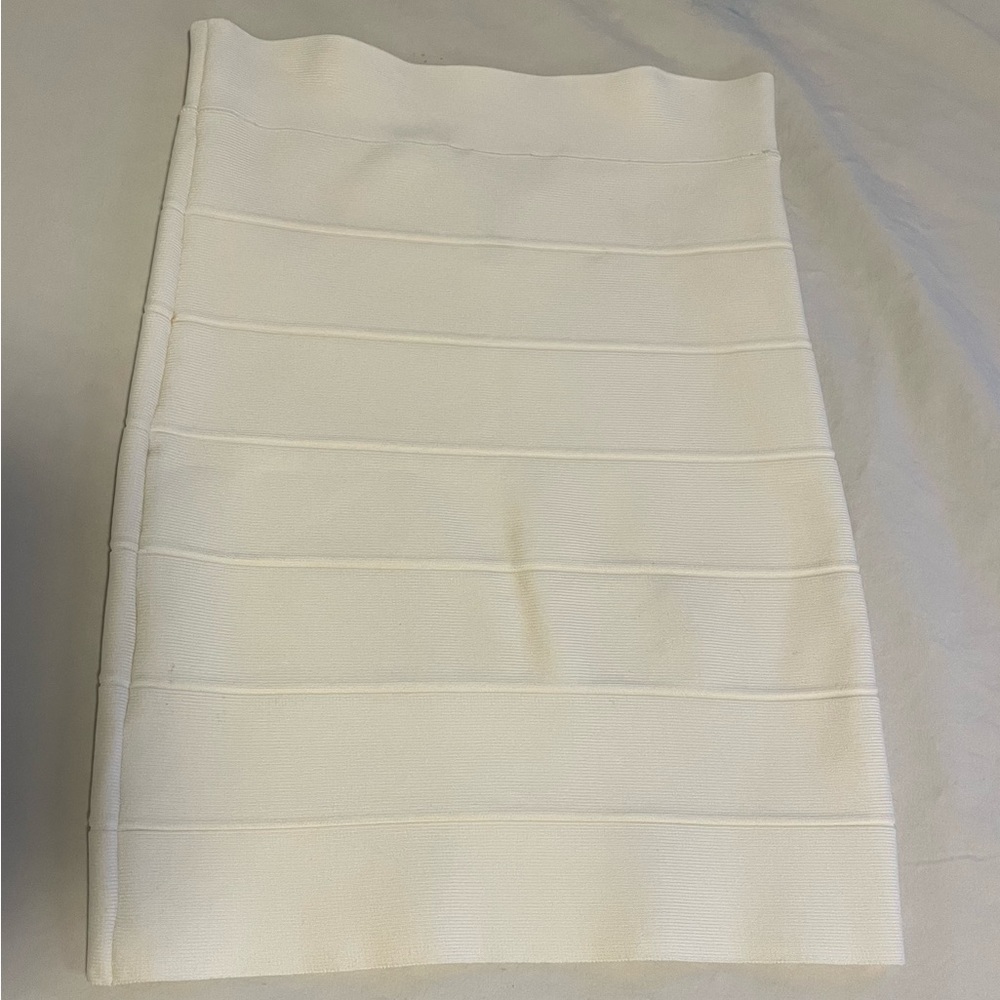 BCBG Small white stretch mini skirt. Supportive fabric gives smooth, sexy lines!